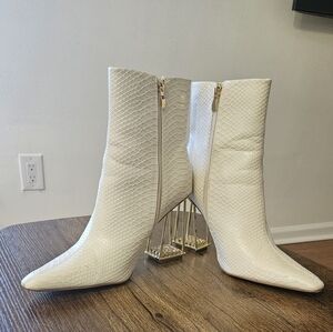 Ashley Klein Ivory Snake-Texture Pointed Ankle Boots with Gold Sculpted Heel